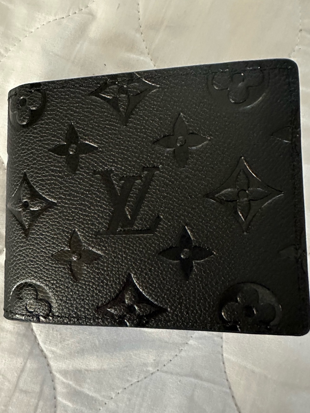 Black Embossed Monogram Bi-Fold Wallet
